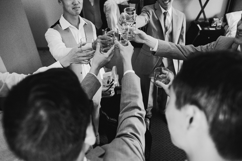 This is the groom and grooomsmen toasting during getting ready.