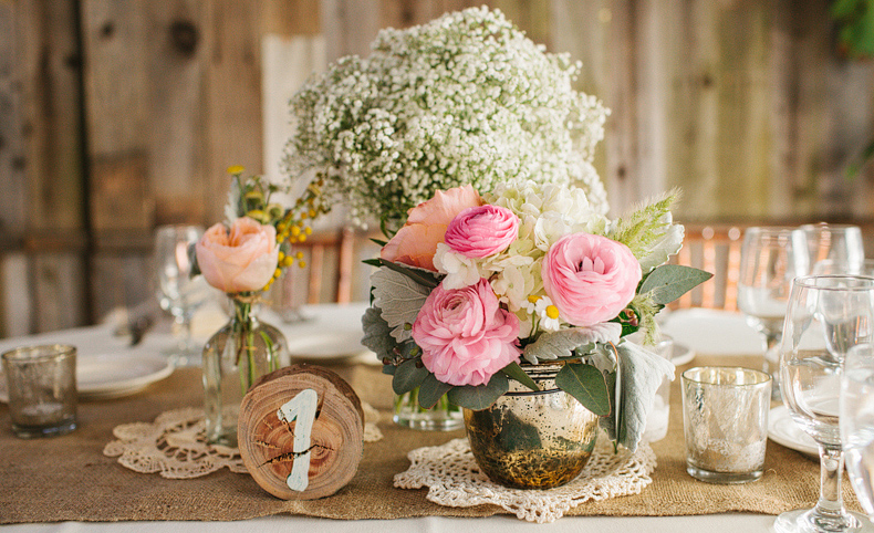 This is a photo of the reception center pieces and place settings.