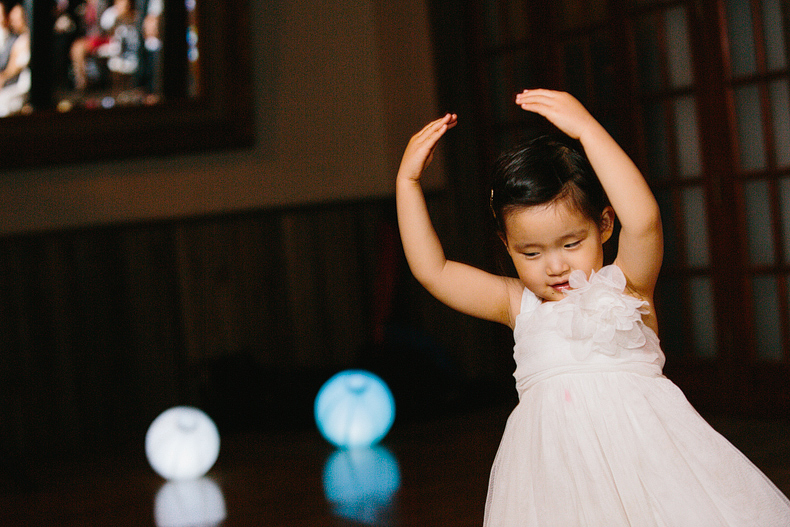 This is an adorable little girl dancing at the reception.