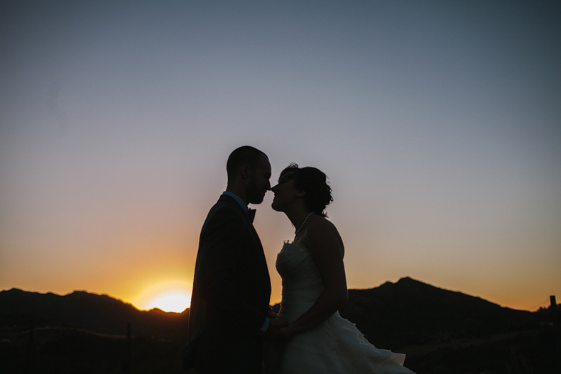 Bride and groom nose to nose. 