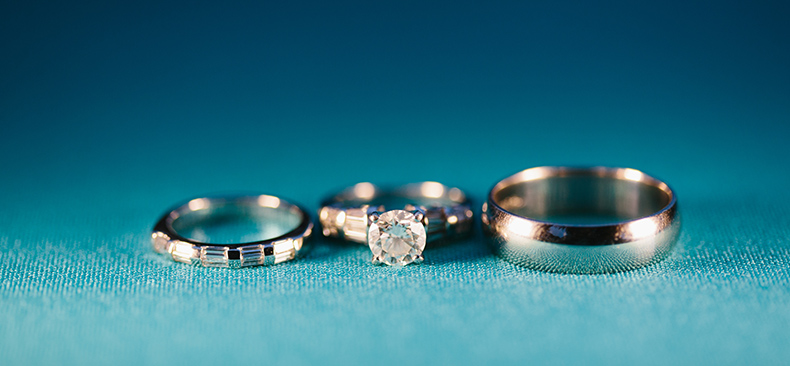 This is a photo of their wedding and engagement rings.