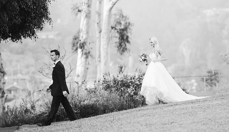 The Bride and Groom are on their way to sign the marriage license.