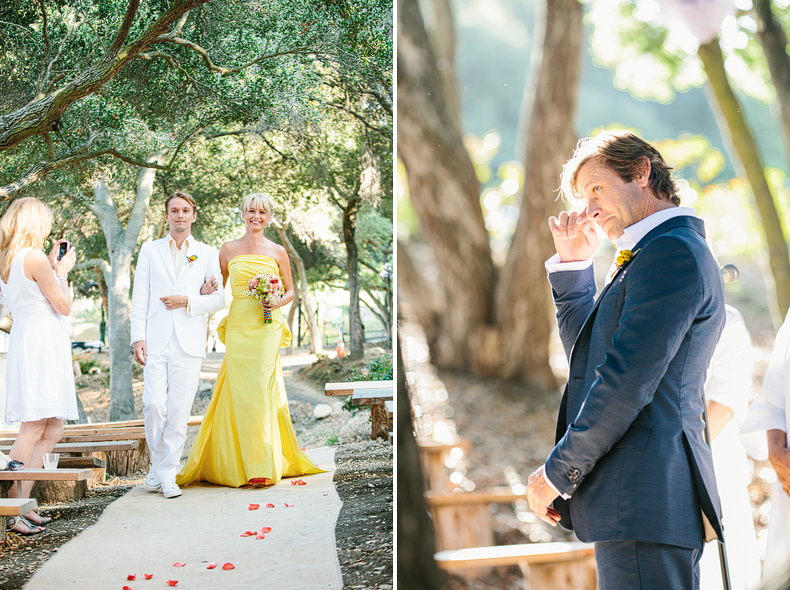 Katherine in her yellow wedding dress walks down the aise.