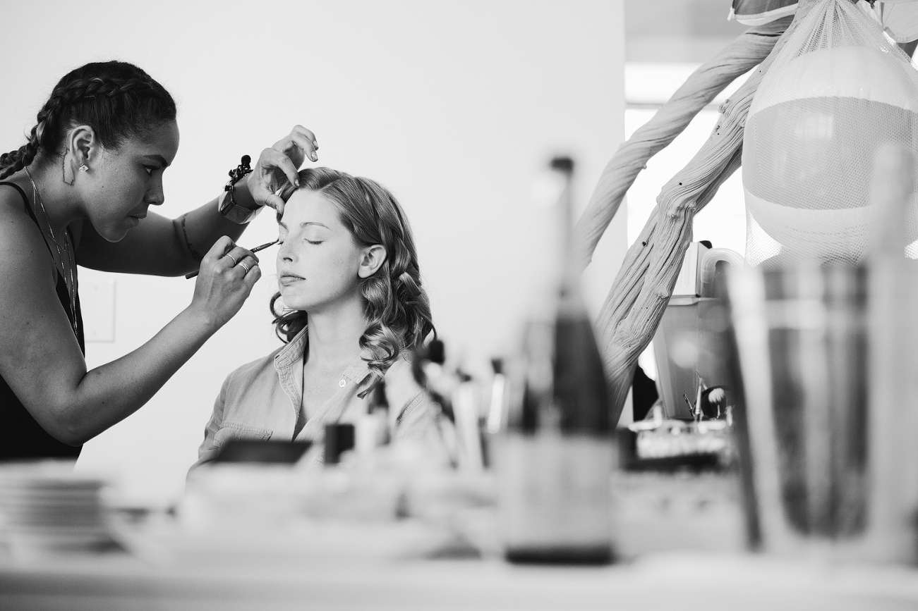 This is a photo of Alix getting her makeup done at Studio DNA.