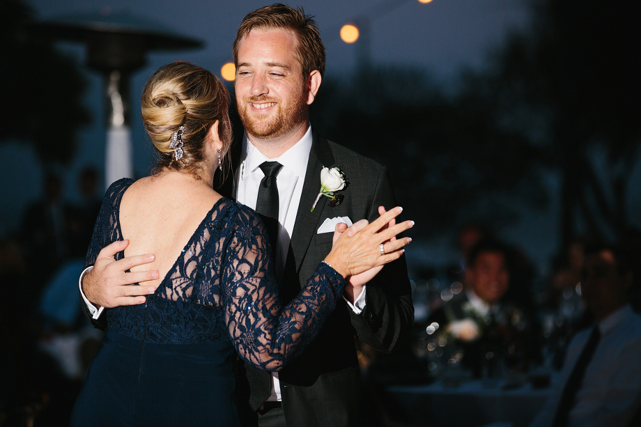 This is a photo of Matt and his mom during the mother son dance.