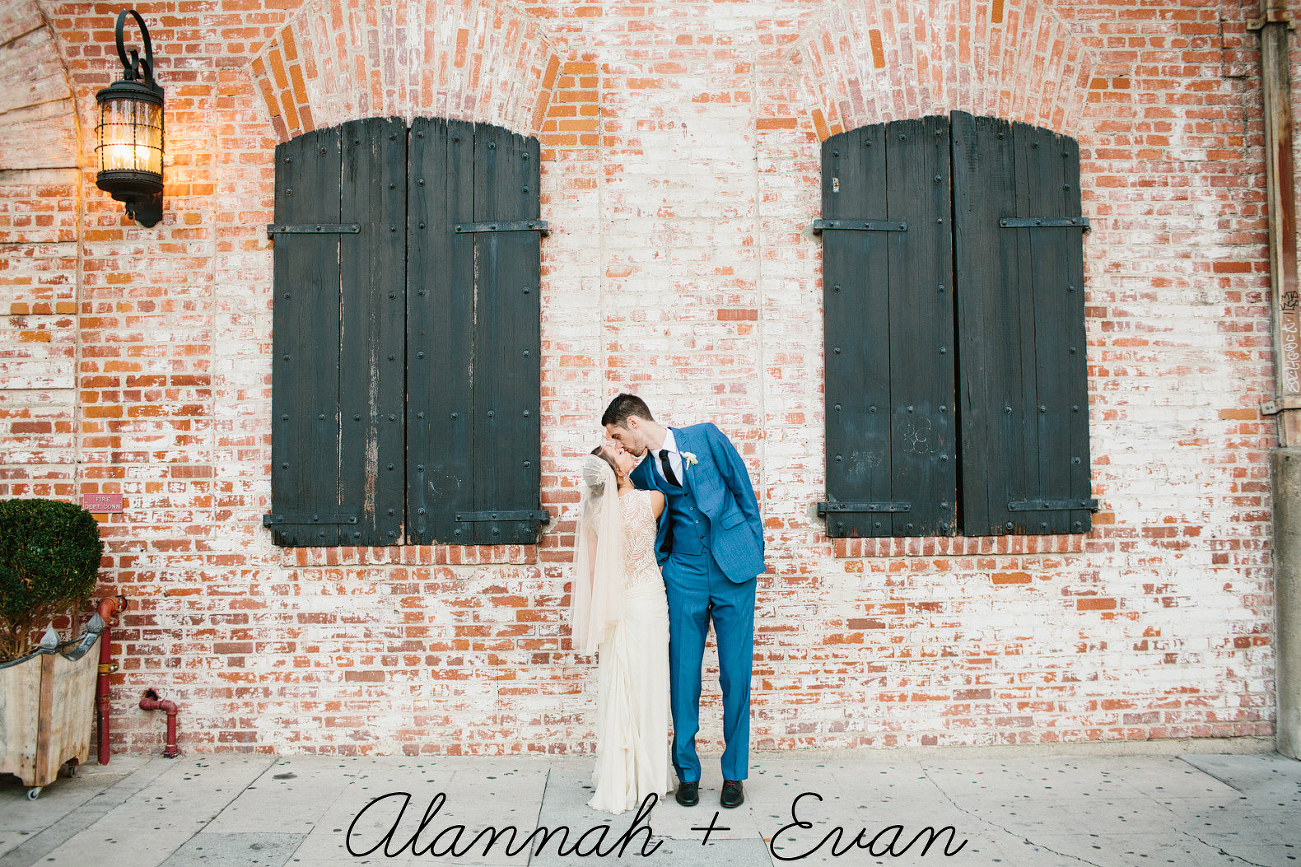 This is a photo of the bride and groom in front of the venue.