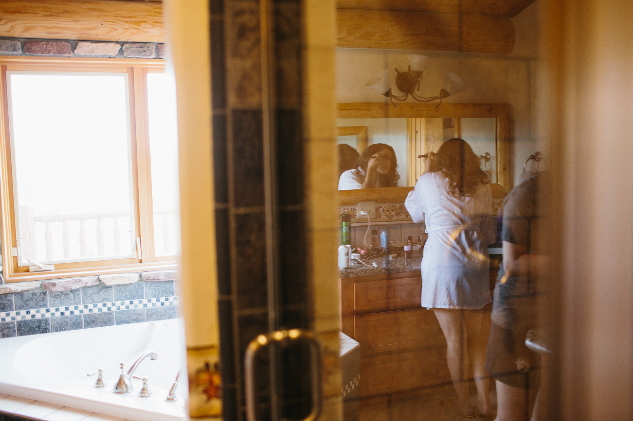 This is a photo of Jenn getting ready for her wedding.