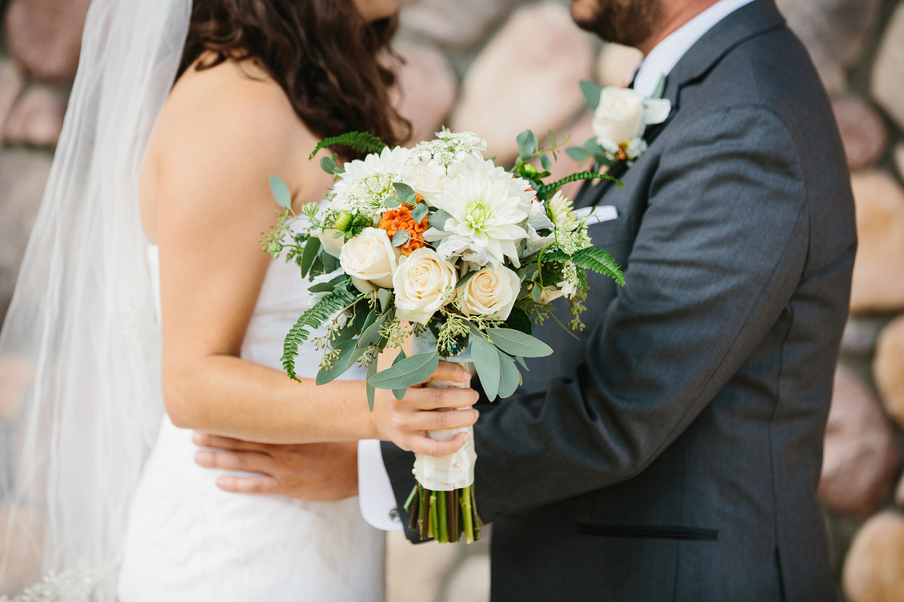 This is a flower detail photo during their first look.