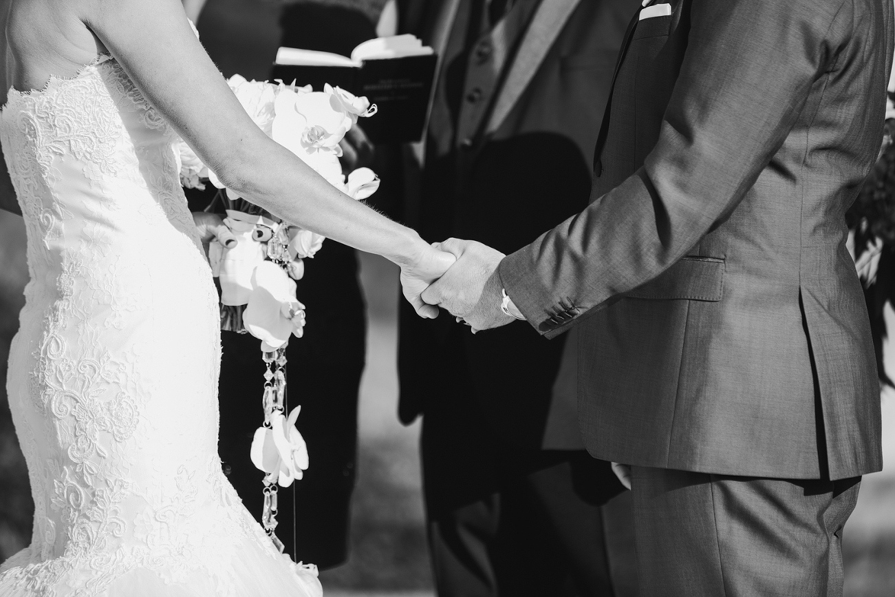 We love it when couples hold hands during their ceremony.