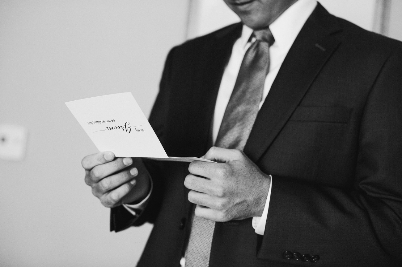 Here is a black and white photo of Steve reading his card from Sidney. 