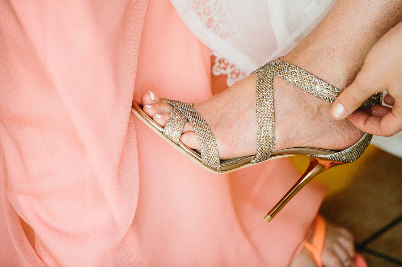 Sidney wore beautiful gold strappy heels. 