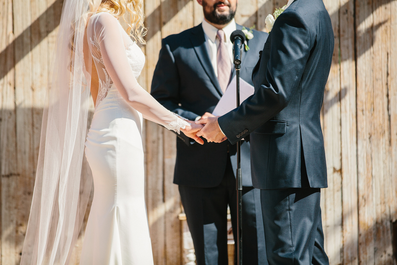 Sidney and Steve held hands during the ceremony. 