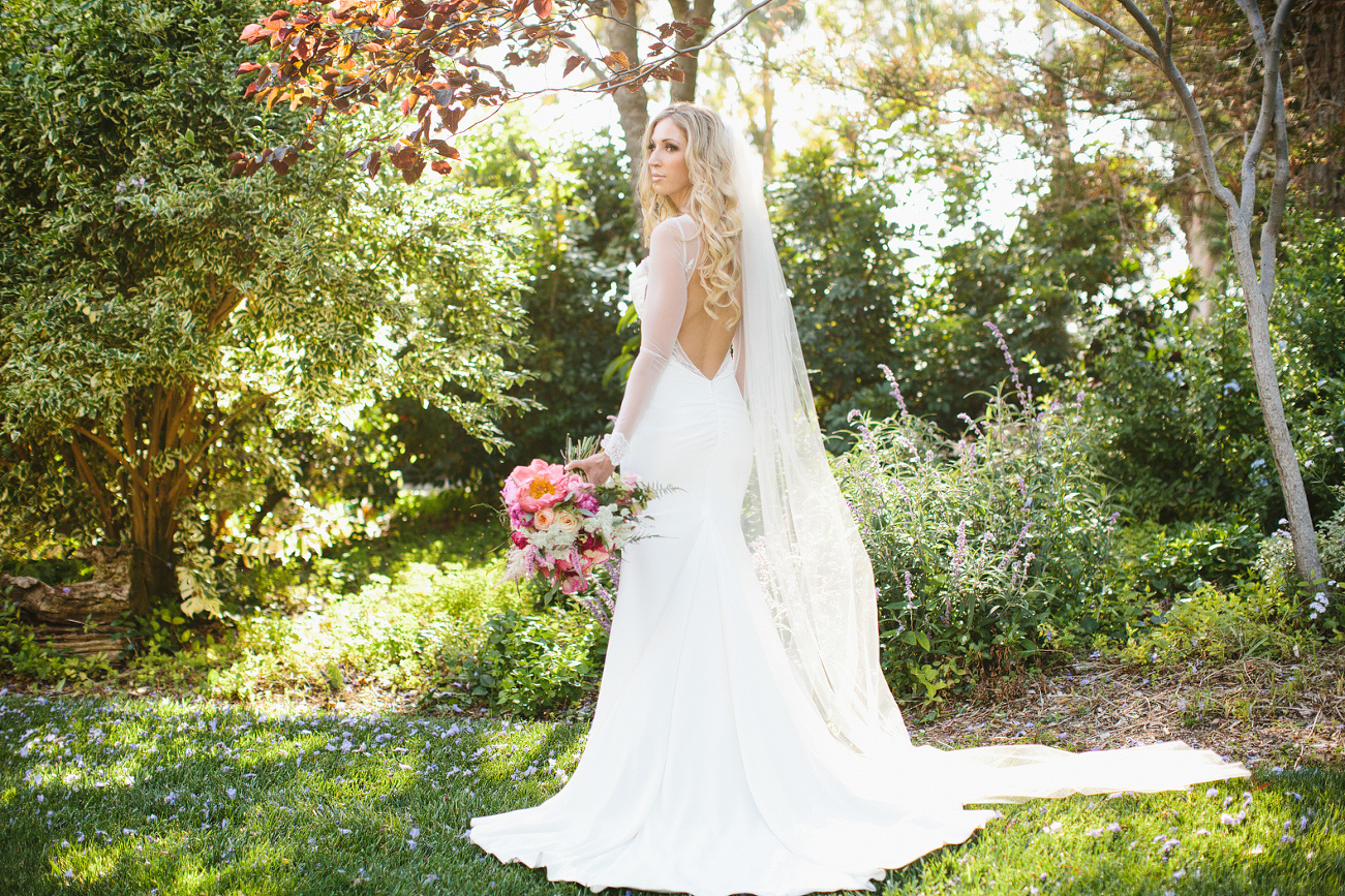 Sidney changed into a beautiful sleeved dress and wore a veil for the ceremony. 