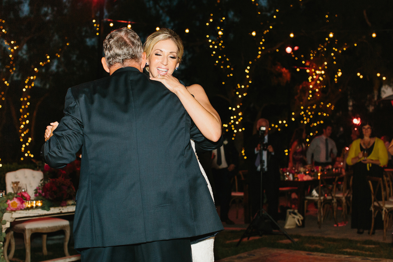This is a photo of the bride dancing with her dad. 