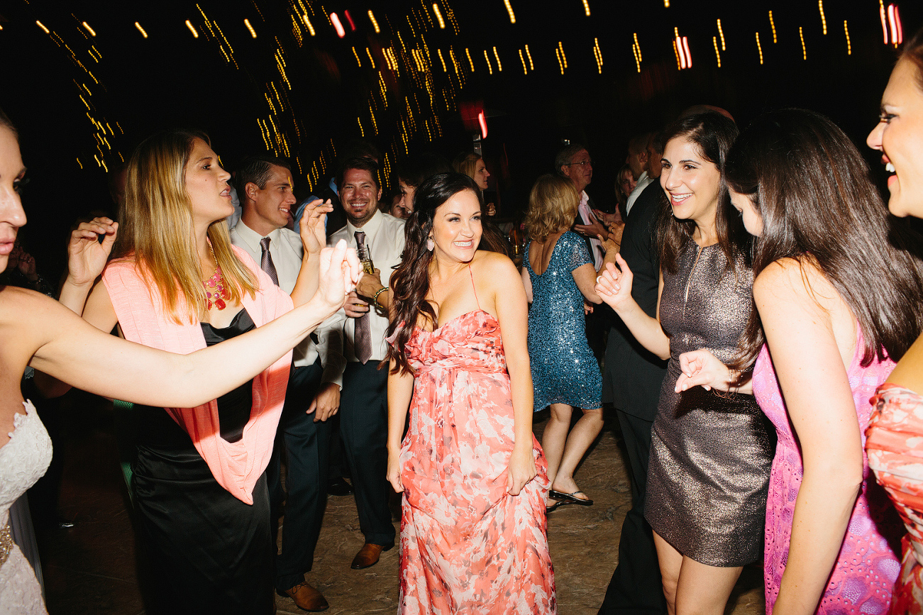 This is a photo of the guests dancing during the reception. 