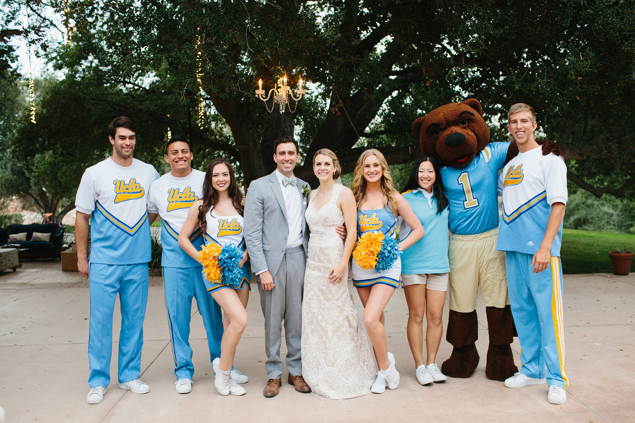 Here is a photo of the bride and groom with the UCLA spirit squad. 