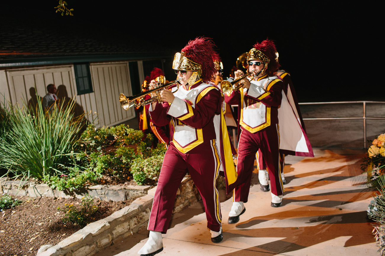 The USC marching band surprised Kelly and Chris at their wedding. 