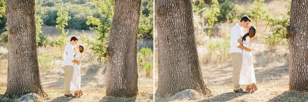 The couple between two large trees. 