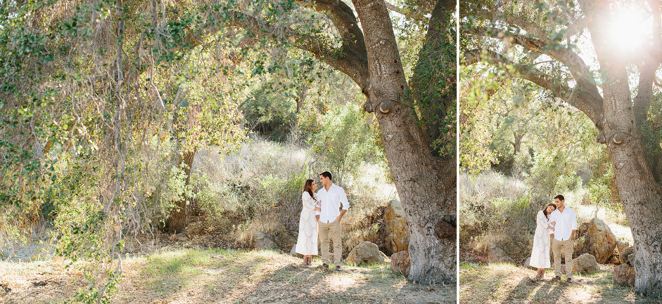 The couple under a large tree. 