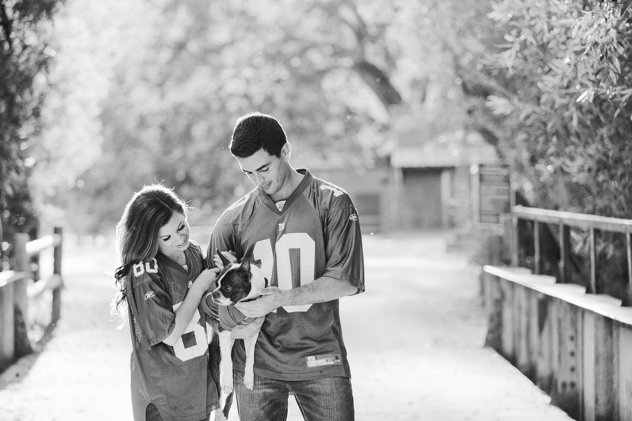 Sara, Sam, and Gus wearing football jerseys.