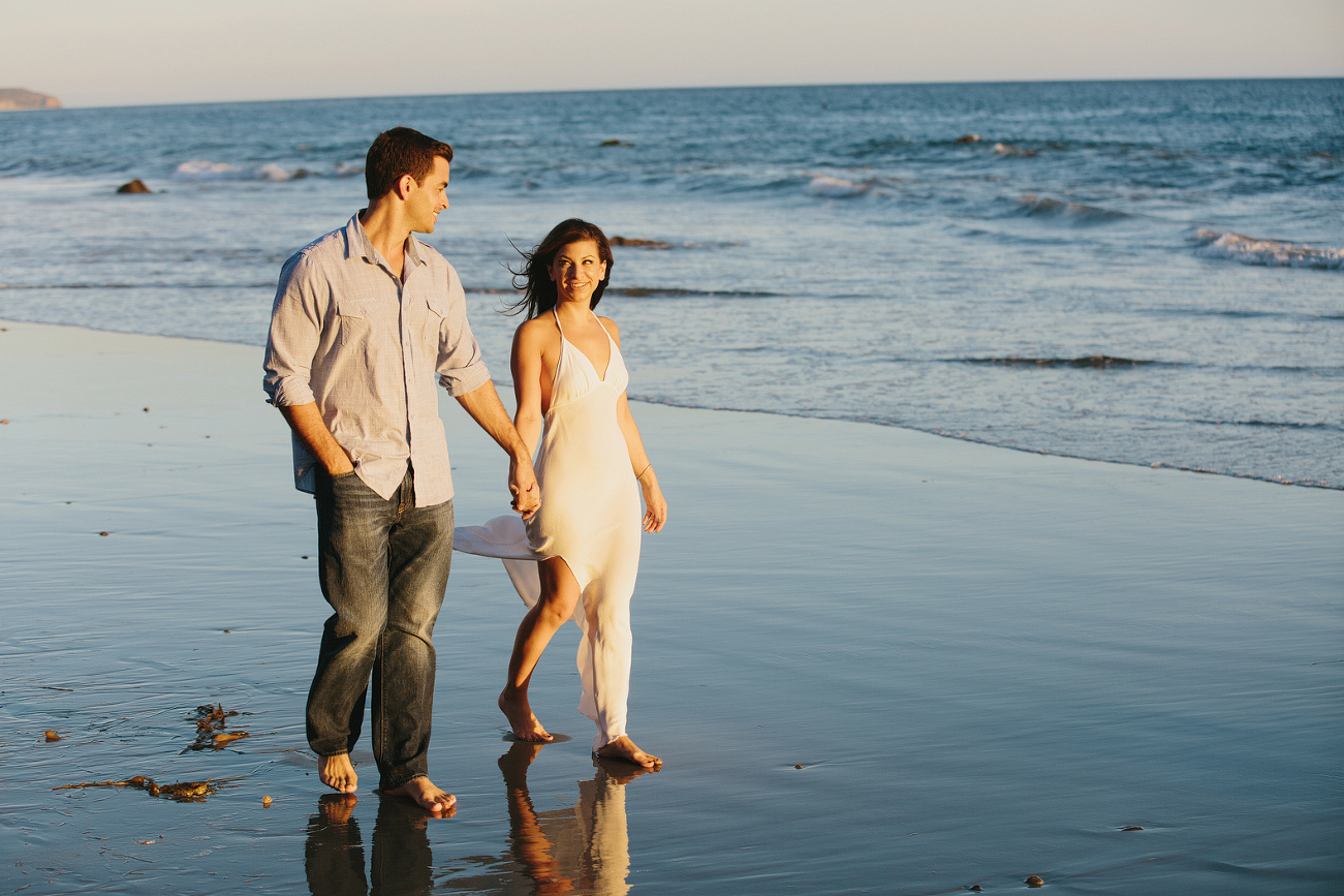 Sara and Sam walking at the beach.