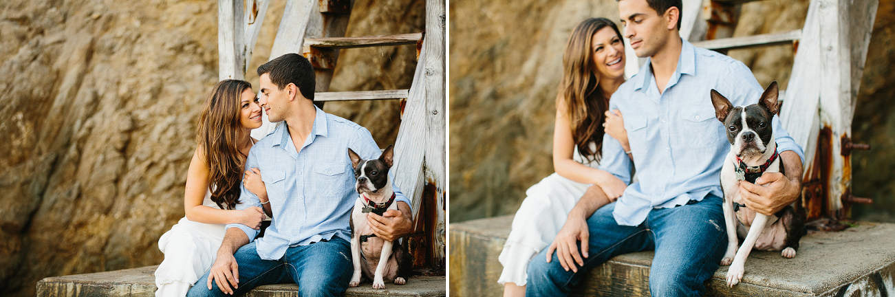 The couple sitting on the stairs. 