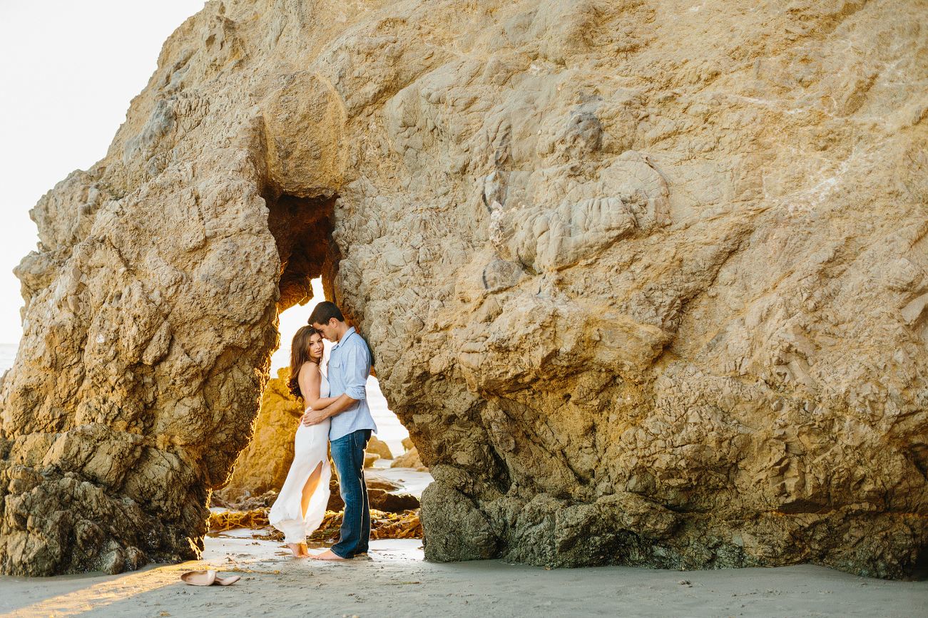 The couple under a large rock. 