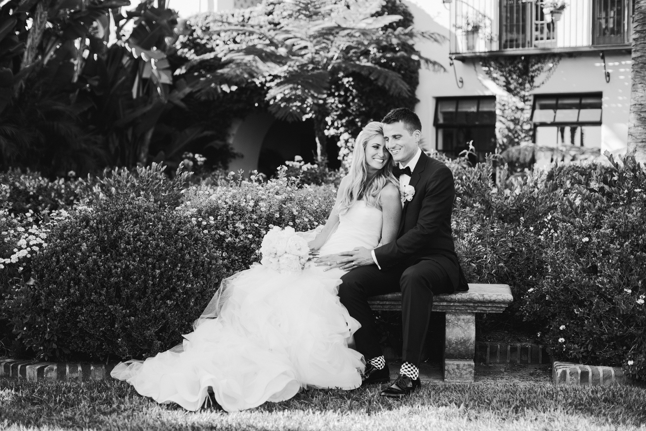 Jaclyn and Nick sitting on a bench. 