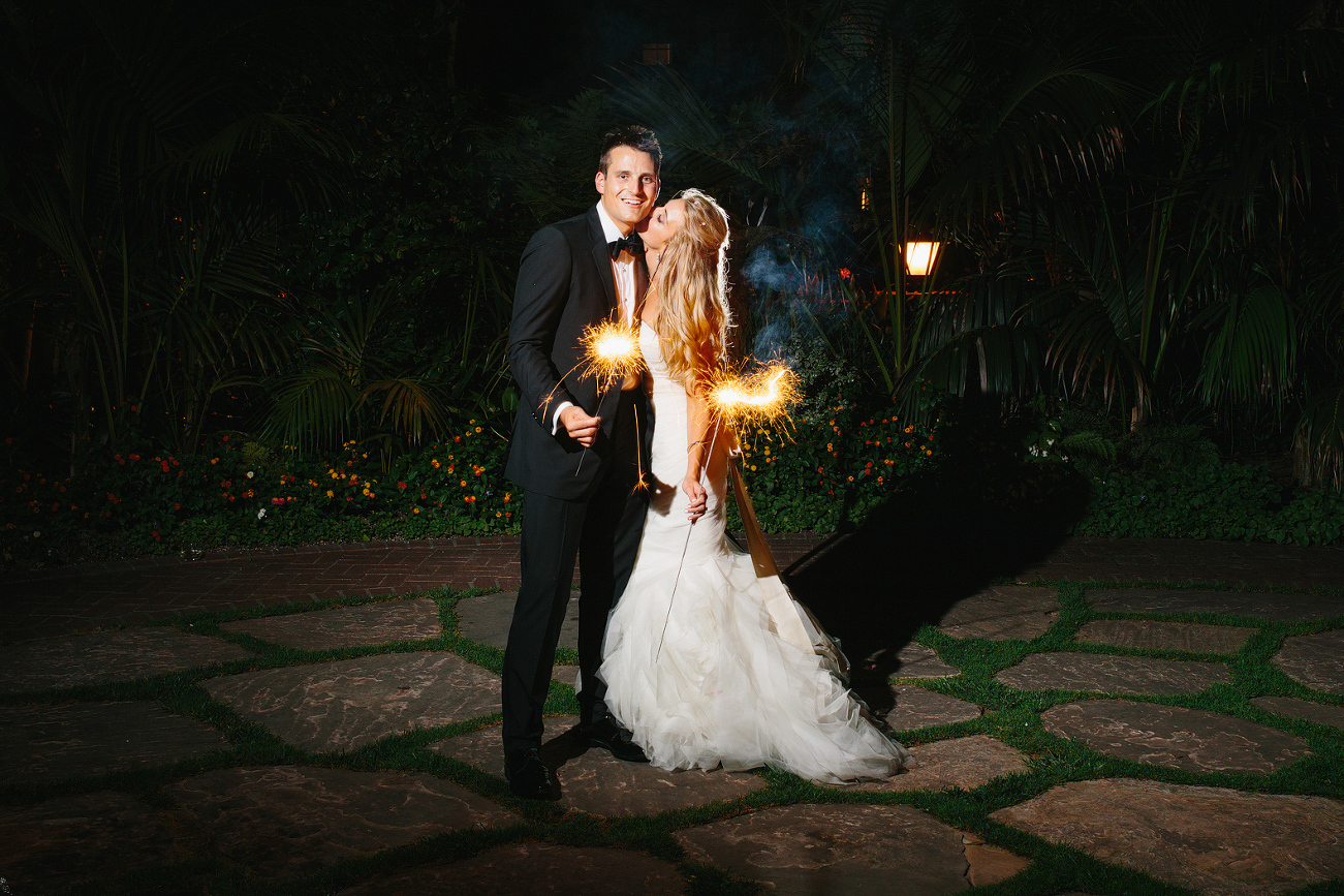 Jaclyn and Nick holding sparklers. 