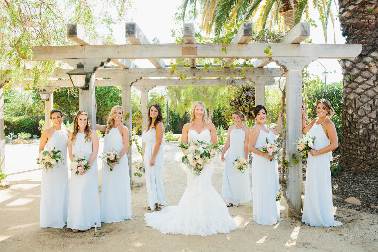 The bridesmaids and bride at the museum. 