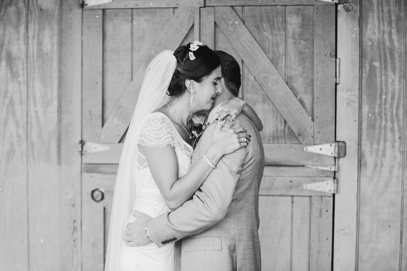 A sweet moment between the bride and groom.