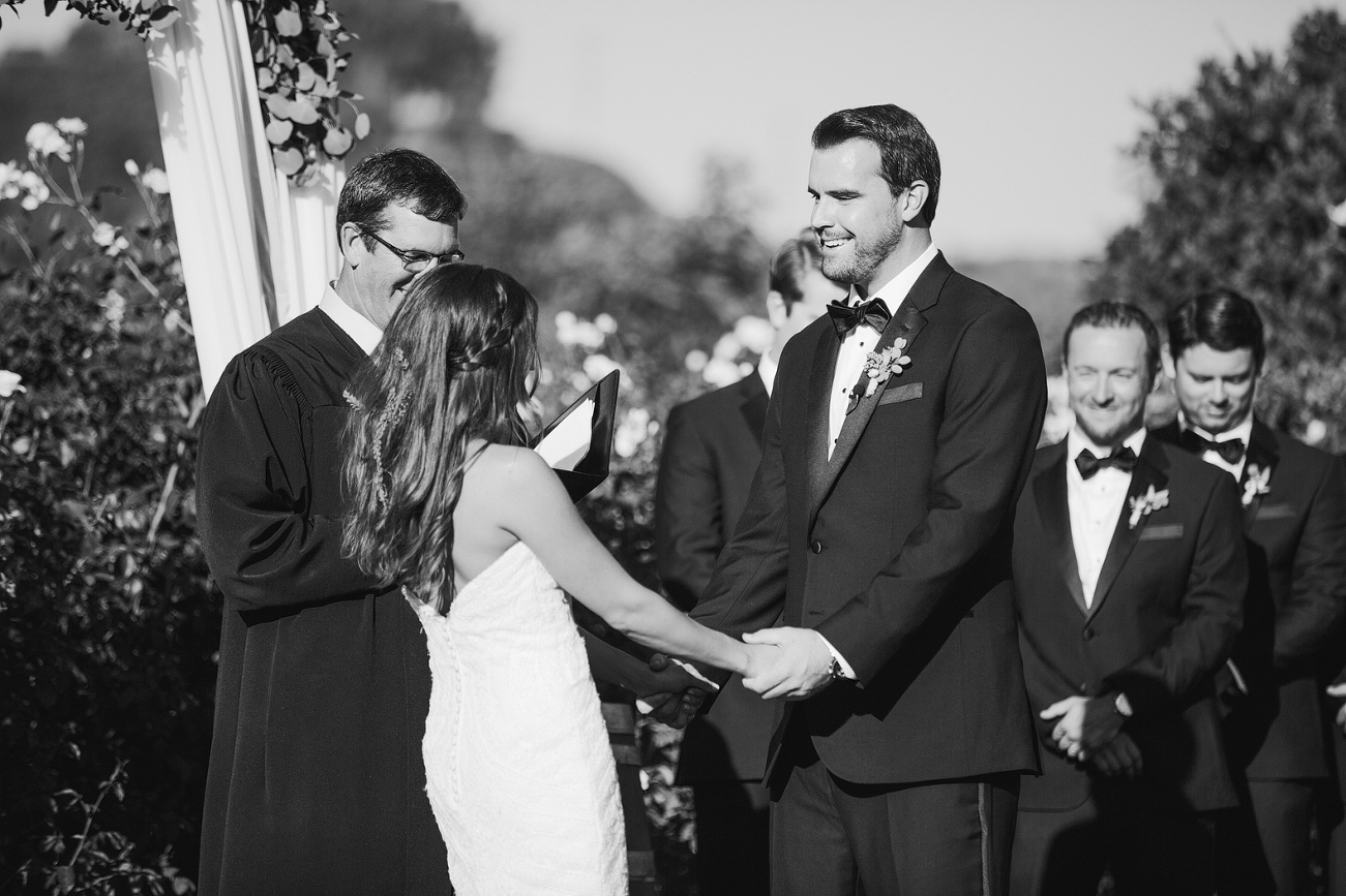 Andy smiling at Larissa during the ceremony. 