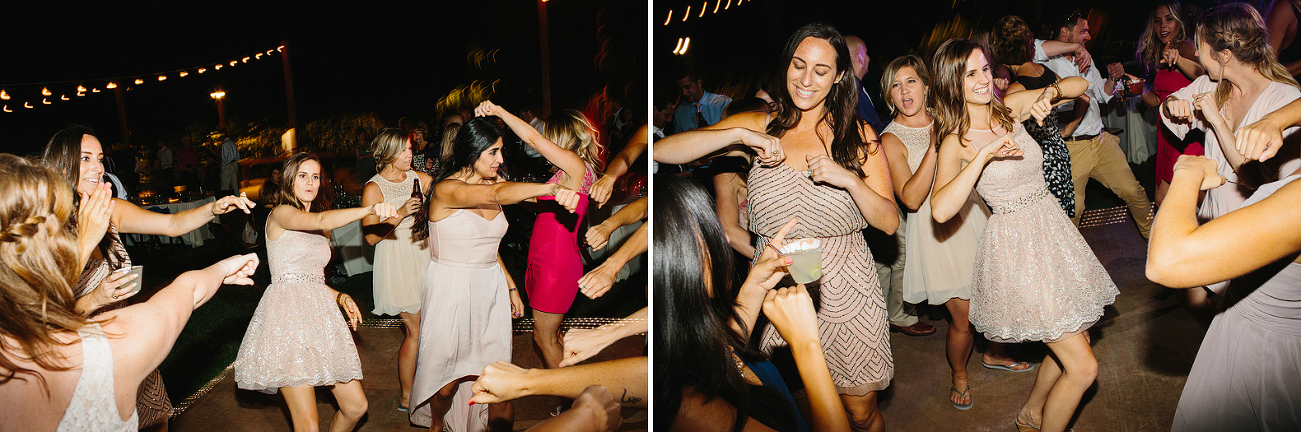 The bridesmaids dancing together. 