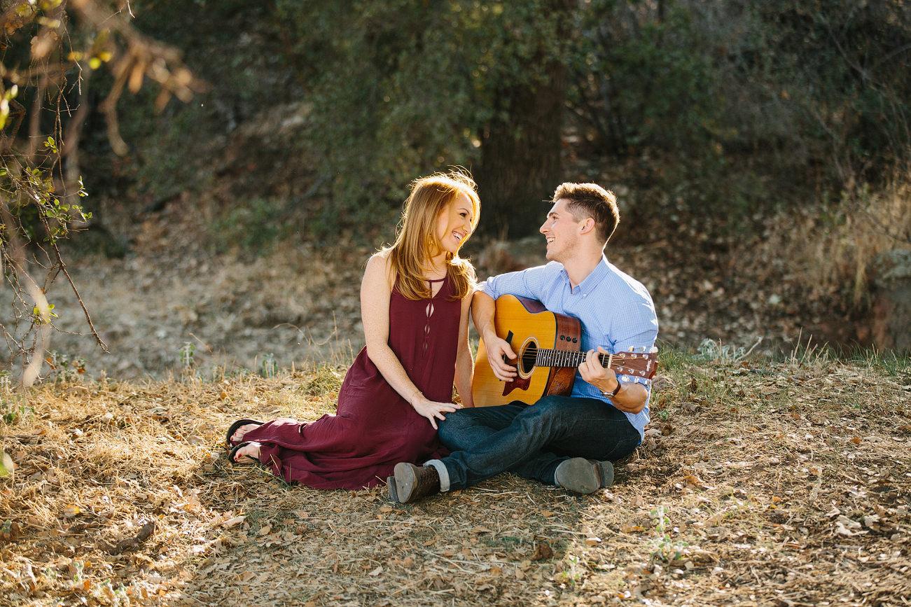 Curt playing the guitar for Mallauri. 