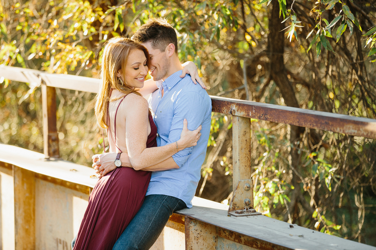 A sweet photo of the couple on the bridge. 