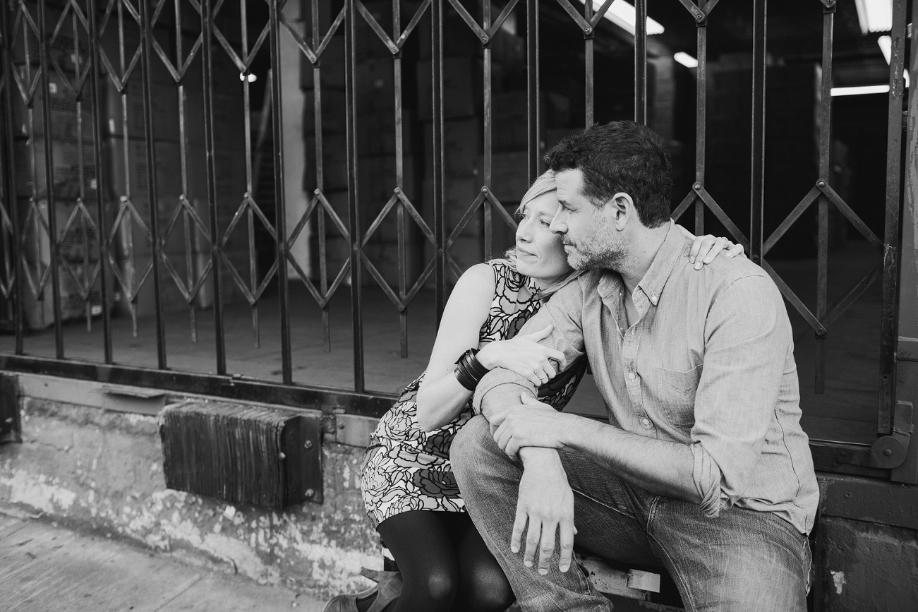 A black and white photo of Hayley and David looking away. 