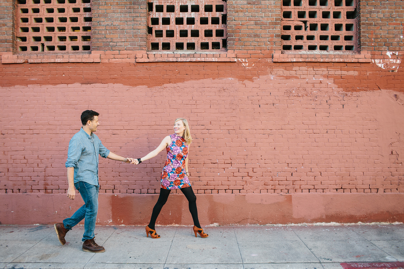 Hayley and David walking along the sidewalk. 