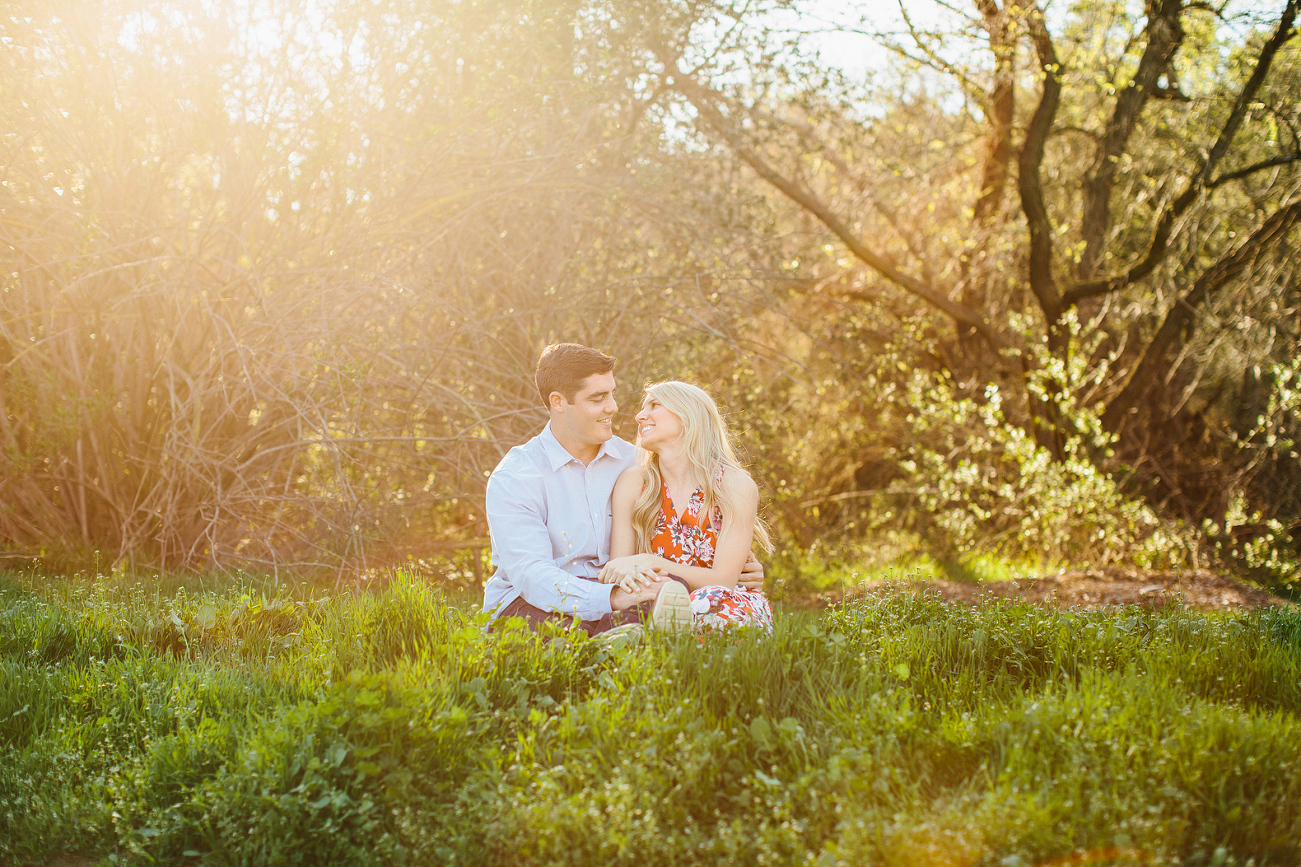 A sun filled photo of the engaged couple. 