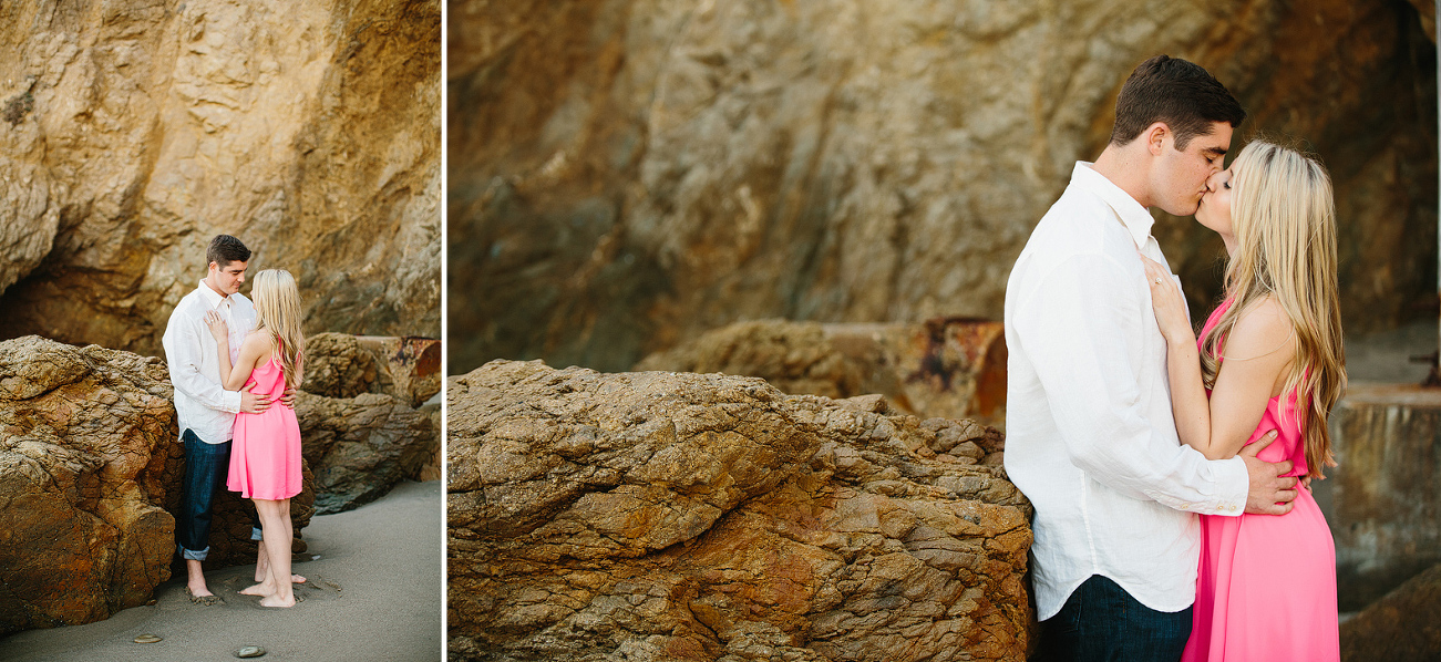 Britt and Steve leaning against a large rock. 