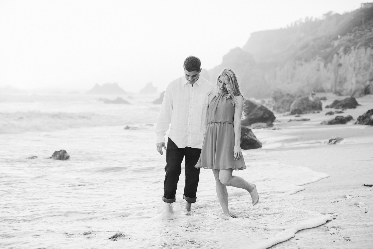 Britt and Steve walking in the water. 