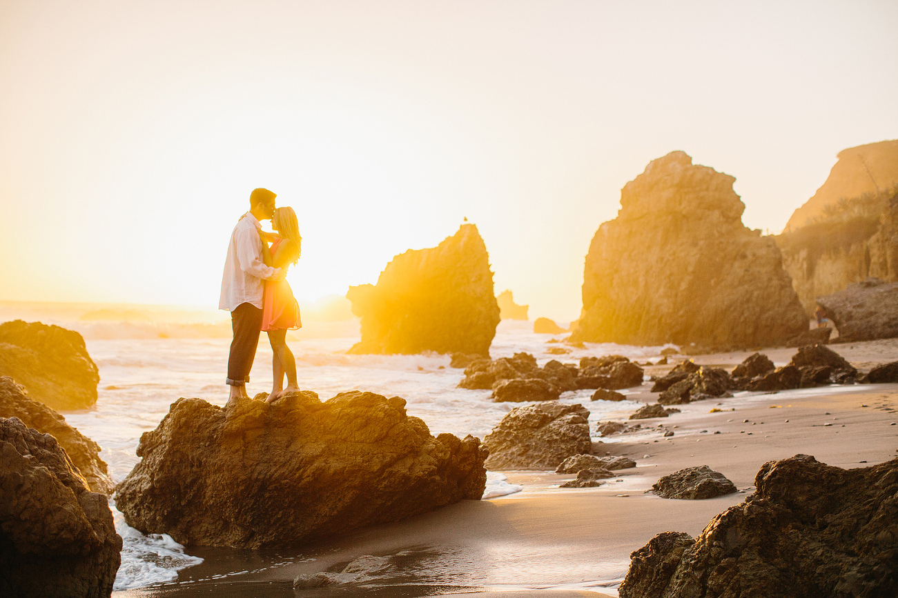 Britt and Steve on a rock at sunset. 