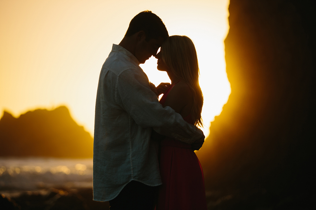 A bright yellow sunset photo of the couple. 