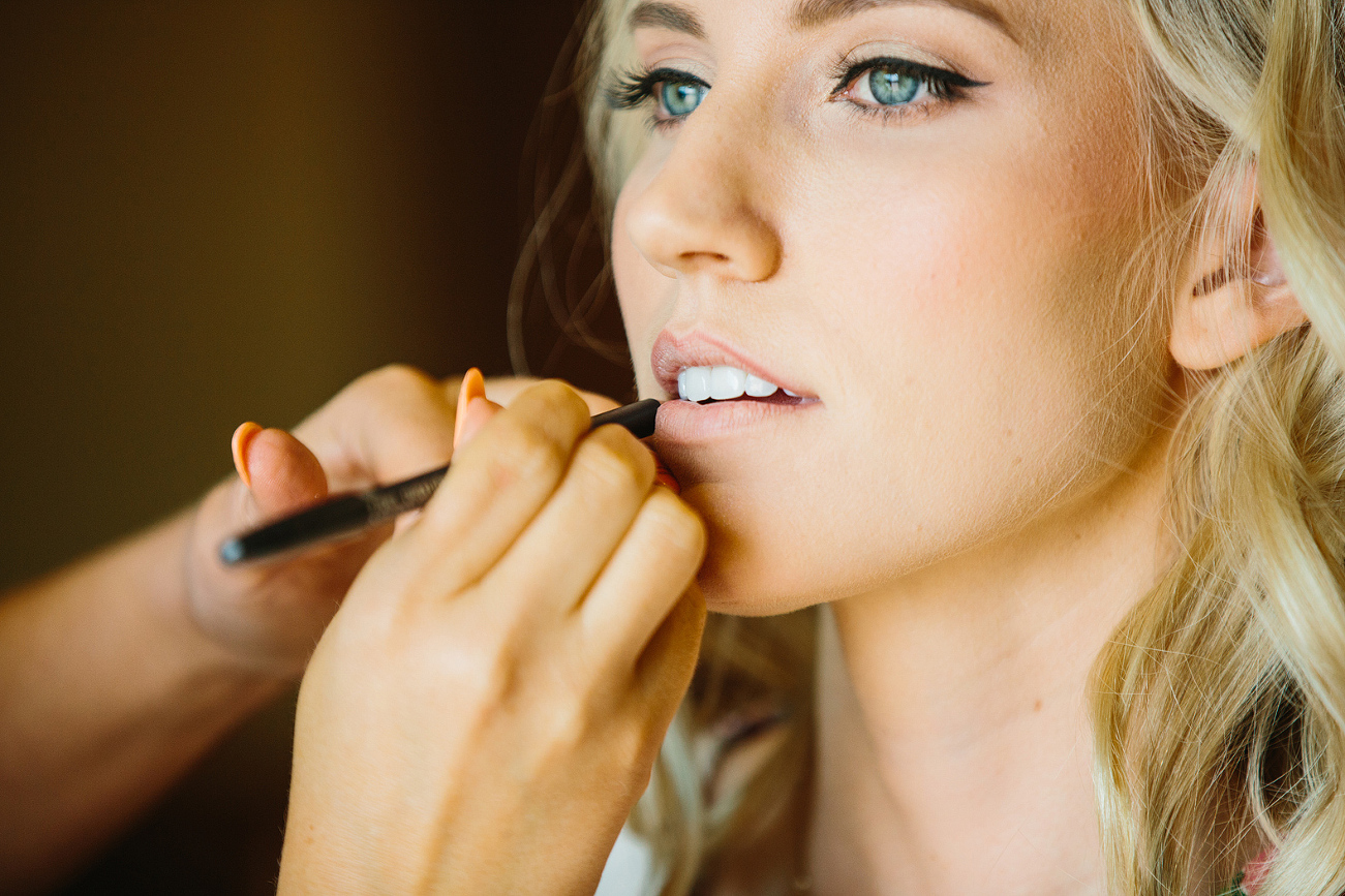 The makeup artist putting on Brittany