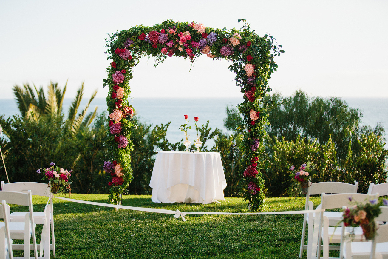 The beautiful floral ceremony arch. 