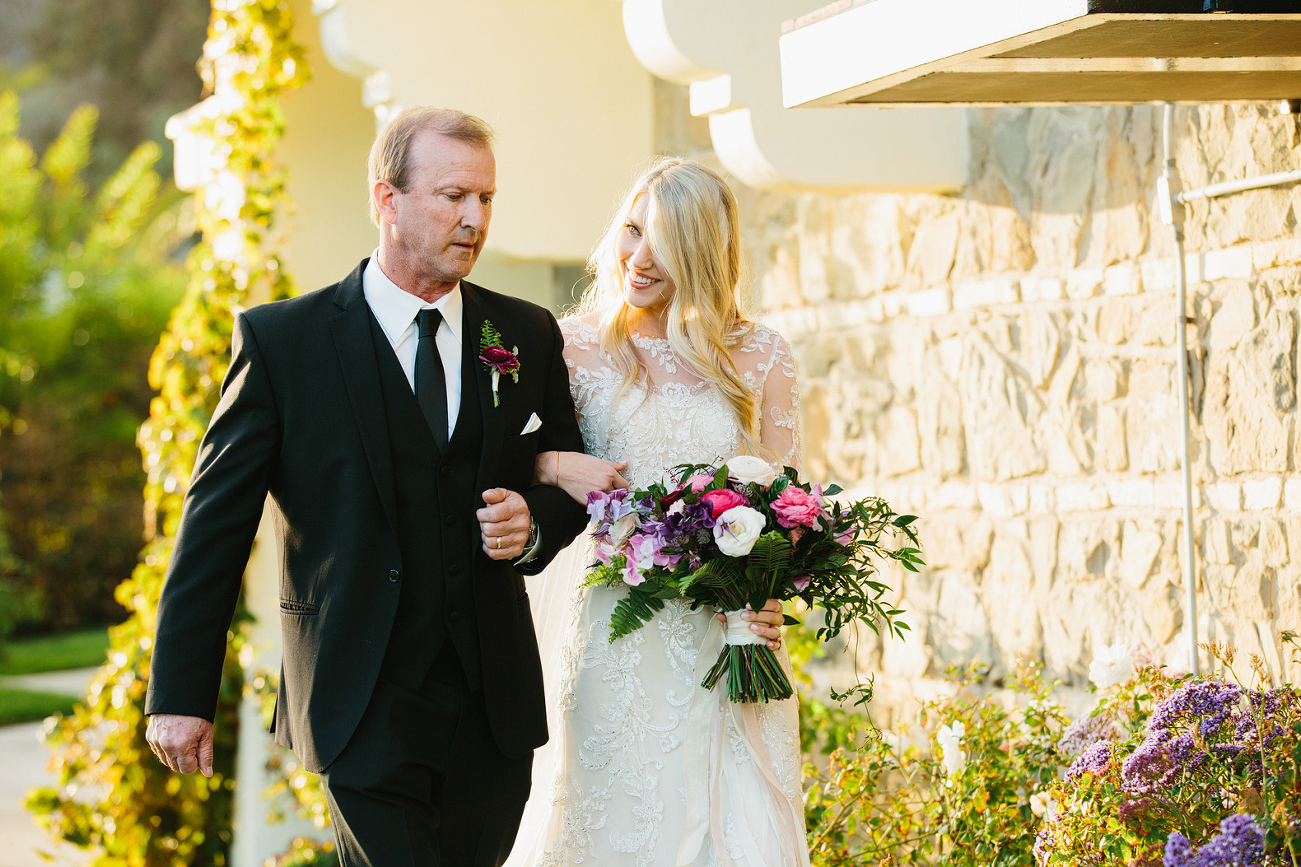 Britt walking down the aisle with her dad. 