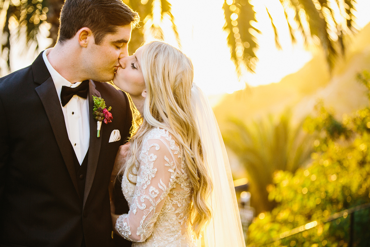 A sweet kiss between the newlyweds. 