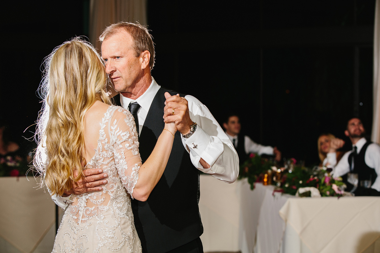 The bride had a special dance with her dad. 