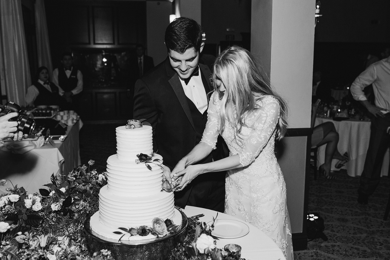 Britt and Steve cutting their cake. 