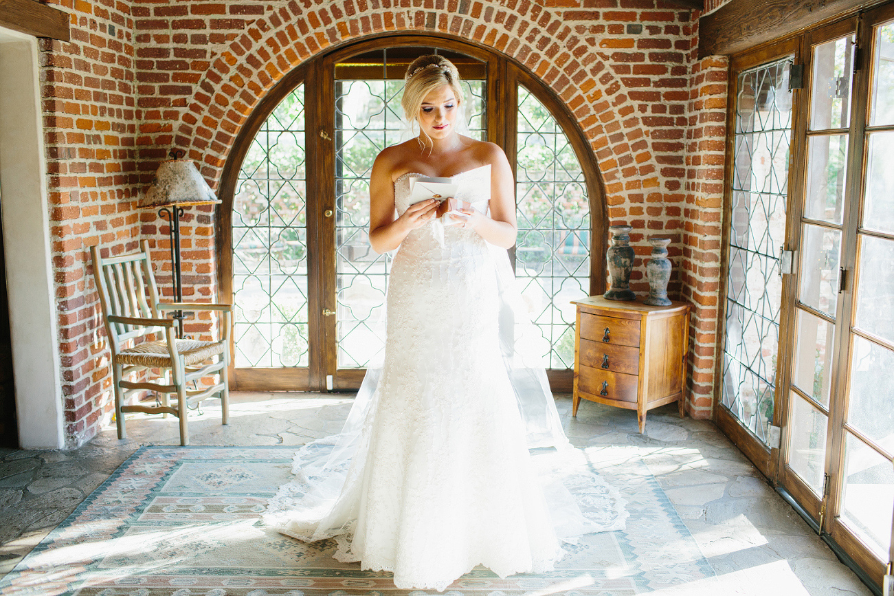 The bride opening a special gift. 