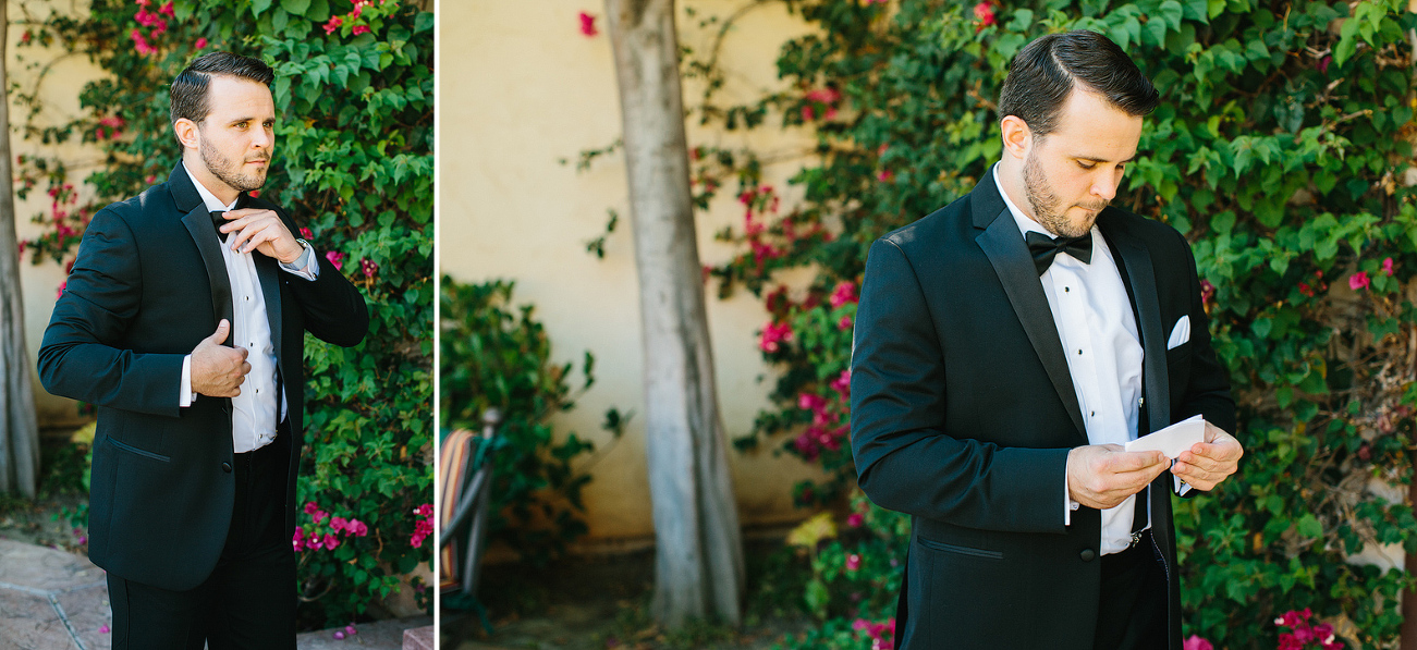 The groom adjusting his bowtie. 